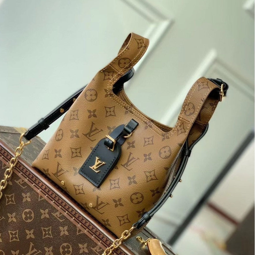 Louis Vuitton Atlantis BB in Tela Monogram Reverse